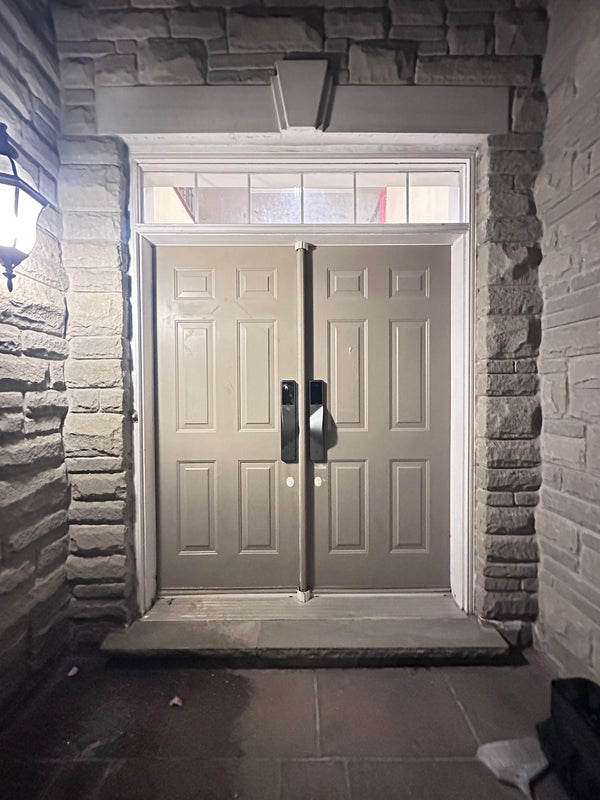 v5 gray and dummy installed on a residential door in a North American home