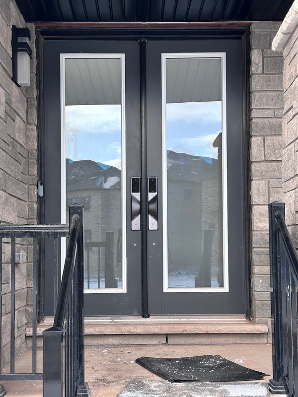 v5 gray and dummy installed on a residential door in a North American home