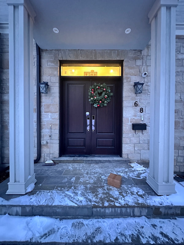 v5 gray and dummy installed on a residential door in a North American home