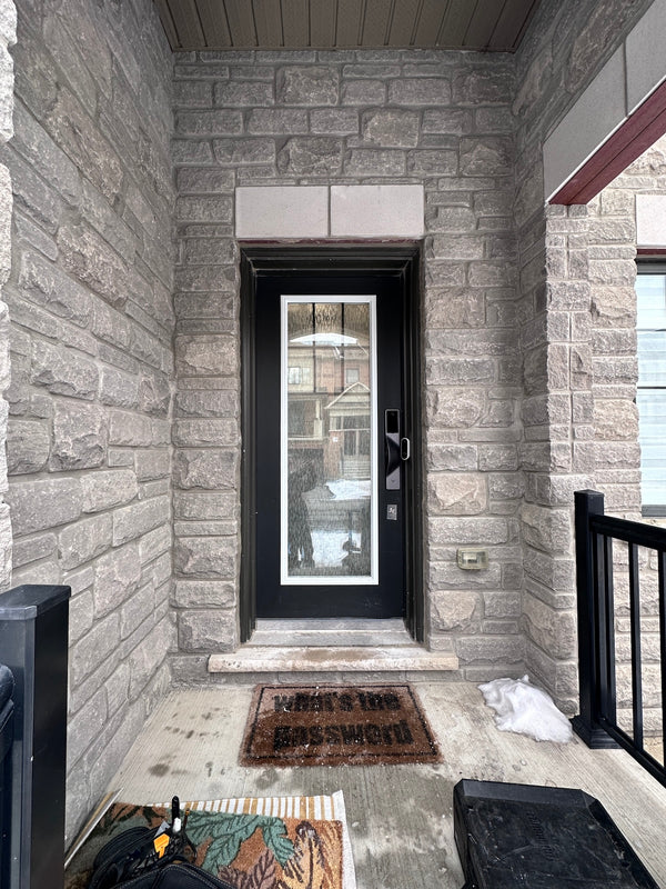 v5 gray installed on a residential door in a North American home