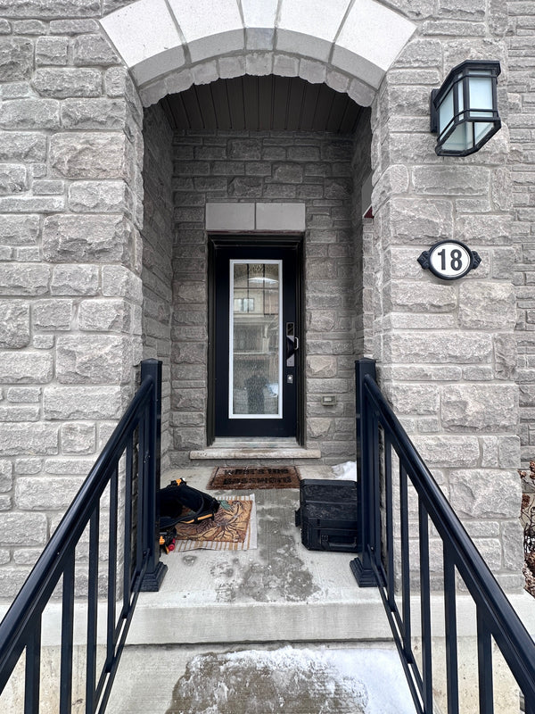 v5 gray installed on a residential door in a North American home