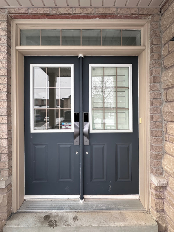 v5 gray and dummy installed on a residential door in a North American home