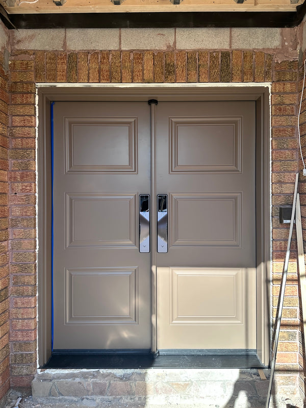 v5 gray and dummy installed on a residential door in a North American home
