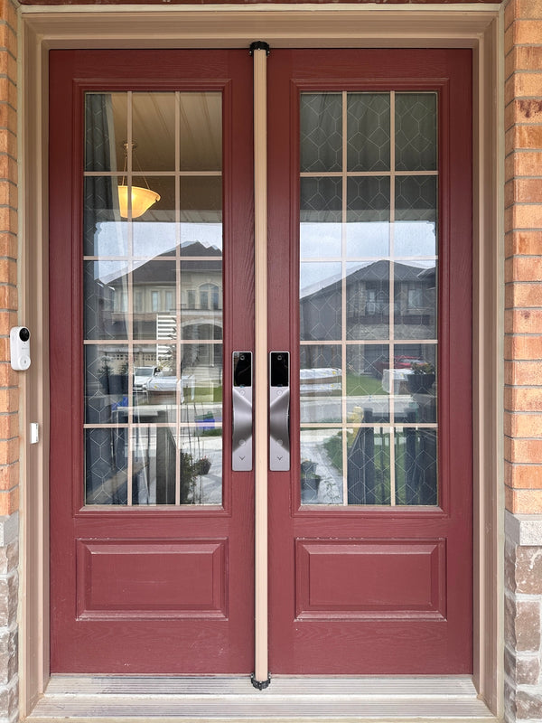 v5 gray and dummy installed on a residential door in a North American home