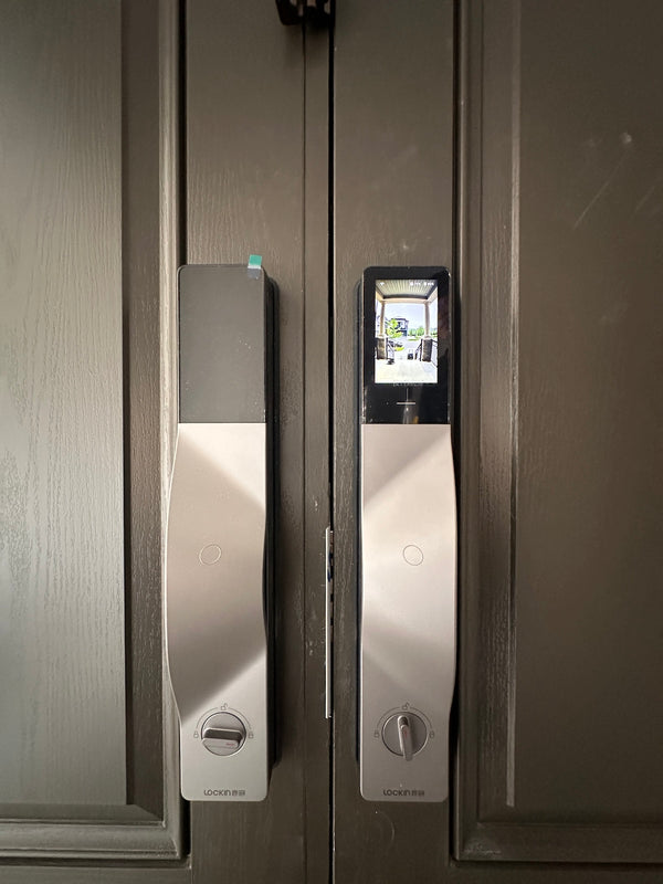 v5 gray and dummy installed on a residential door in a North American home