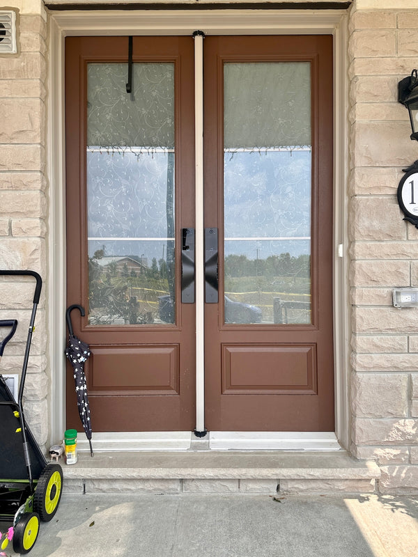 v5 black and dummy installed on a residential door in a North American home