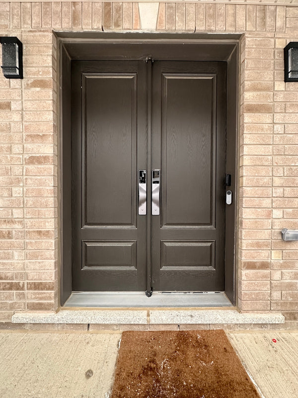 v5 gray and dummy installed on a residential door in a North American home