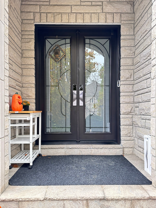 v5 gray and dummy installed on a residential door in a North American home