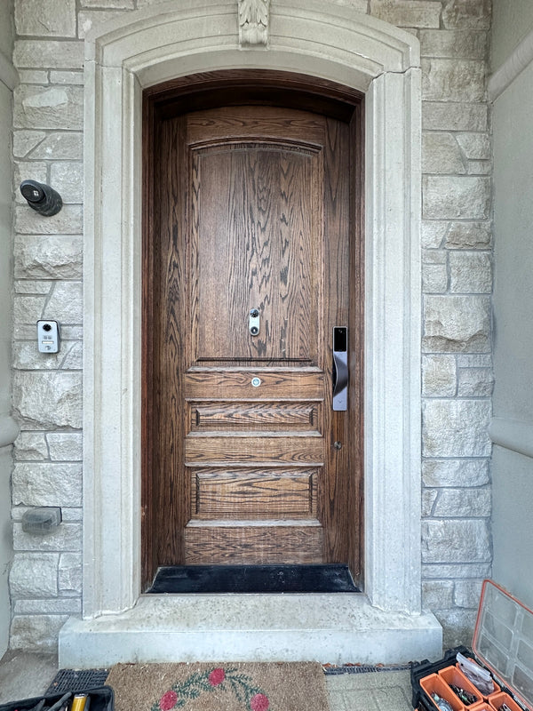 v5 gray installed on a residential door in a North American home
