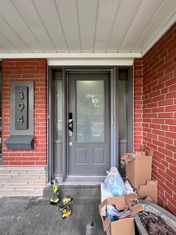 v5 gray installed on a residential door in a North American home