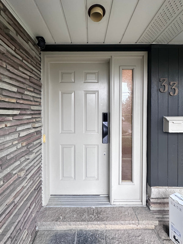 v5 gray installed on a residential door in a North American home