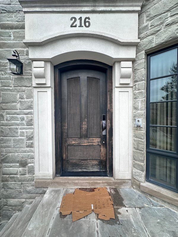 v5 gray installed on a residential door in a North American home