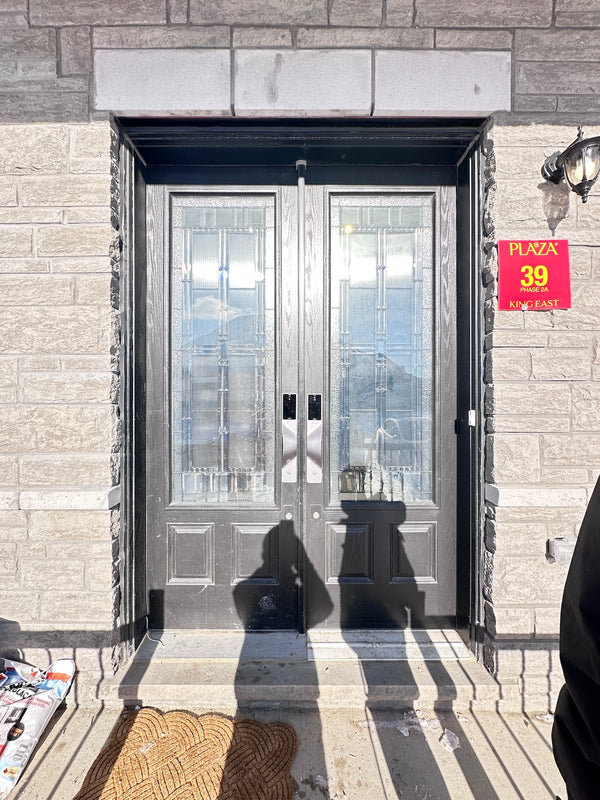 v5 gray and dummy installed on a residential door in a North American home